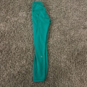Lululemon green leggings, worn once. No marks or stains. New condition.